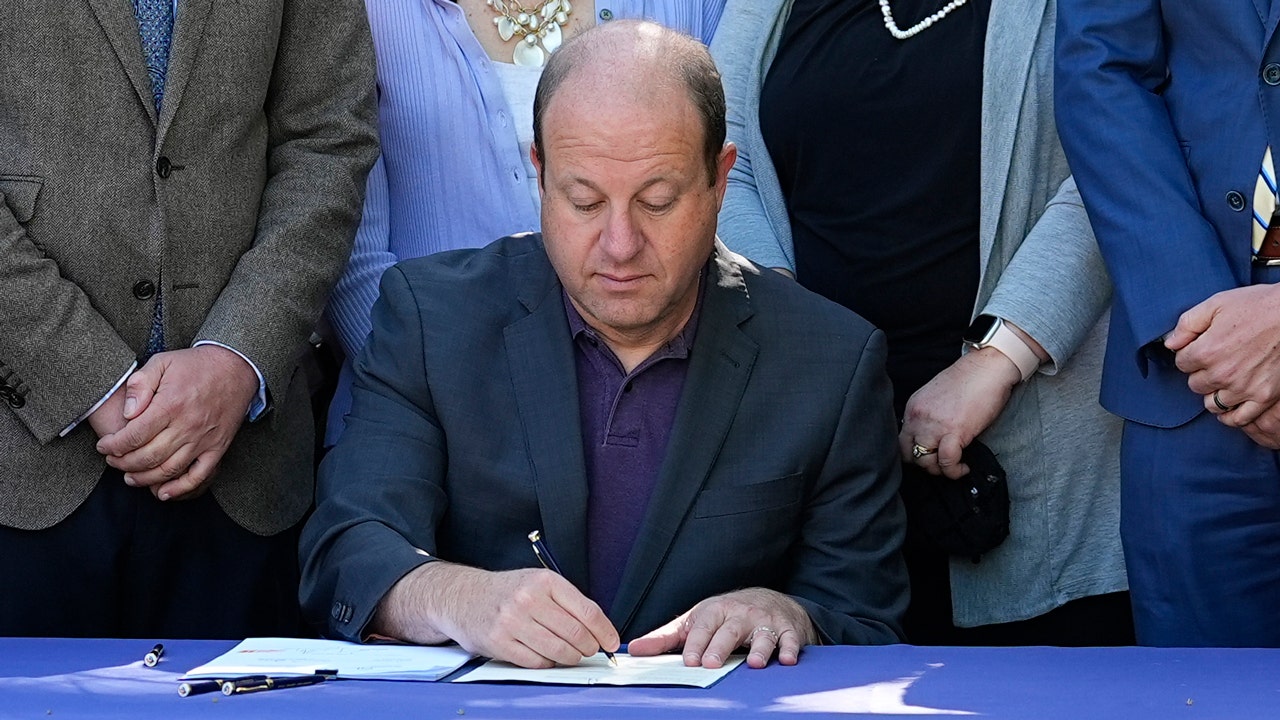 Colorado Governor Polis signs the crackdown on funeral homes into law