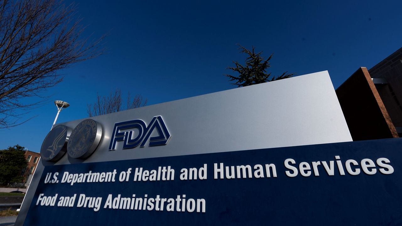 A sign in front of the Food and Drug Administration building is seen on Dec. 10, 2020, in Silver Spring, Md. The FDA's tobacco division is plagued by a lack of clear direction and priorities that have hampered its ability to regulate electronic cigarettes and other products under its oversight, according to a report released Monday, Dec. 19, 2022. (AP Photo/Manuel Balce Ceneta)